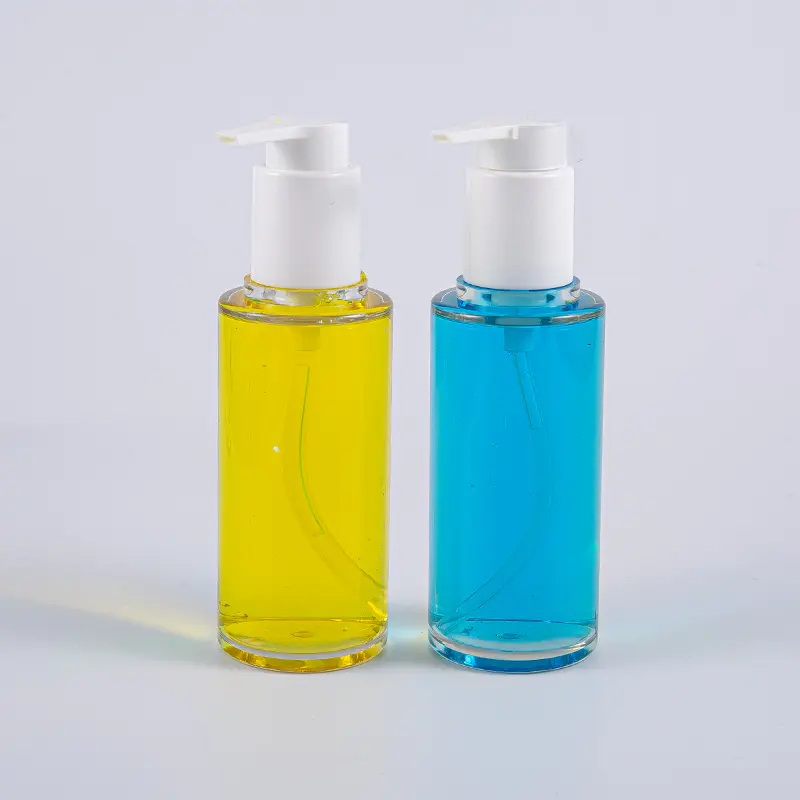 Klar PETG 100 ml rund form lotionflaske med hvit plastpumpe