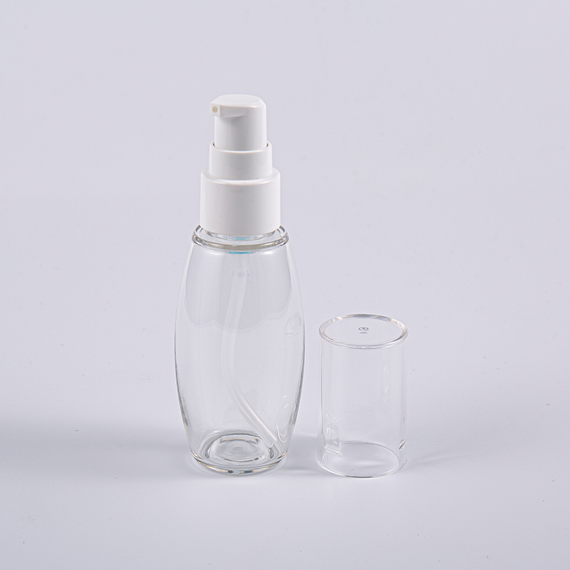 På reise Bruk 50 ml PETG ballformflaske med pumpe På reise Bruk 50 ml PETG ballformflaske med pumpe